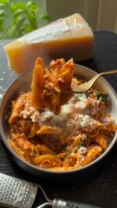 Penne Pasta held in a spoon